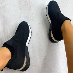 Classic all black and white slip on trainers