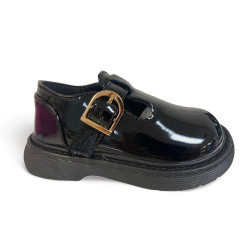 strapped buckle shoe